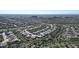 An aerial view showcasing a well-planned residential community surrounded by lush desert landscaping at 6887 E Hacienda La Colorada Dr, Gold Canyon, AZ 85118