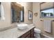 Bathroom features a modern sink and a framed mirror above the vanity at 6887 E Hacienda La Colorada Dr, Gold Canyon, AZ 85118