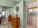 Stylish bathroom with a glass shower, ample storage and tile floors at 6887 E Hacienda La Colorada Dr, Gold Canyon, AZ 85118