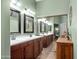 Well-lit bathroom featuring double sinks and a large mirror at 6887 E Hacienda La Colorada Dr, Gold Canyon, AZ 85118