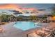 Beautiful community pool with lounge chairs, mountain views, and a serene atmosphere at 6887 E Hacienda La Colorada Dr, Gold Canyon, AZ 85118
