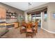Cozy dining area with lots of natural light coming in through a sliding glass door at 6887 E Hacienda La Colorada Dr, Gold Canyon, AZ 85118