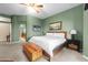 Spacious main bedroom featuring green walls and a wooden accent chest at 6887 E Hacienda La Colorada Dr, Gold Canyon, AZ 85118