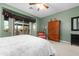 Comfortable main bedroom boasts an outside view and a charming sitting area at 6887 E Hacienda La Colorada Dr, Gold Canyon, AZ 85118