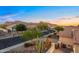 A picturesque neighborhood street view with desert landscaping and mountain views at 6887 E Hacienda La Colorada Dr, Gold Canyon, AZ 85118