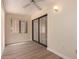 Bright sunroom with sliding doors, windows, and modern flooring at 1021 S Greenfield Rd # 1194, Mesa, AZ 85206