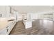 Spacious kitchen with large island, stylish tile floors, and seamless flow to living spaces at 14742 W Lariat Trl, Surprise, AZ 85387