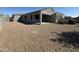 Desert landscape with patio and private backyard at 3021 N 306Th Ln, Buckeye, AZ 85396