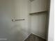 Bright closet featuring a sturdy shelf and hanging rod for optimal storage solutions at 3021 N 306Th Ln, Buckeye, AZ 85396