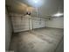 Spacious three car garage with clean and sealed concrete floors at 3021 N 306Th Ln, Buckeye, AZ 85396