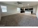 Inviting living room showcasing an open floor plan and bright, airy atmosphere at 3021 N 306Th Ln, Buckeye, AZ 85396