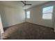 Bright main bedroom with carpet and windows, providing plenty of natural light at 3021 N 306Th Ln, Buckeye, AZ 85396