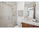 Bathroom featuring a glass-enclosed shower, a vanity with wooden cabinets and a sink at 7701 E Golden Eagle Cir, Gold Canyon, AZ 85118