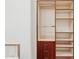 Spacious closet with built-in shelving, wooden drawers, and a hanging rod, providing ample storage space at 7701 E Golden Eagle Cir, Gold Canyon, AZ 85118