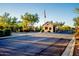 A beautiful stone gatehouse welcomes you to the community at 7701 E Golden Eagle Cir, Gold Canyon, AZ 85118
