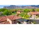 Relaxing patio with a pergola overlooking the lush landscaping at 7701 E Golden Eagle Cir, Gold Canyon, AZ 85118