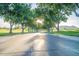 Tree-lined street leading to the community golf course at 7701 E Golden Eagle Cir, Gold Canyon, AZ 85118