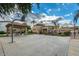 Community basketball court near clubhouse and pool offers residents outdoor activity and recreation in a landscaped setting at 10136 E Southern Ave # 2048, Mesa, AZ 85209
