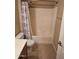 Bathroom featuring a toilet and tub with an elegant patterned curtain at 10136 E Southern Ave # 2048, Mesa, AZ 85209