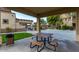 Inviting picnic area with tables and seating under covered structure, perfect for outdoor dining and gatherings at 10136 E Southern Ave # 2048, Mesa, AZ 85209