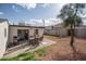 Backyard boasts a brick patio, outdoor seating, decorative rock, and a relaxing space at 1108 N Esther St, Tempe, AZ 85288