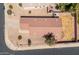 Overhead view of home with desert landscaping, block wall, and pool at 11343 W Mccaslin Rose Ln, Surprise, AZ 85378