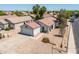 Charming single-story home with a well-maintained yard and a two-car garage in a friendly neighborhood at 11343 W Mccaslin Rose Ln, Surprise, AZ 85378
