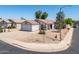 Charming single-story home with a well-maintained yard and a two-car garage in a friendly neighborhood at 11343 W Mccaslin Rose Ln, Surprise, AZ 85378