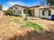 Spacious backyard featuring a covered patio, providing ample space for outdoor activities at 12644 N 152Nd Ave, Surprise, AZ 85379