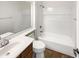 Bathroom with vanity, sink and a bathtub and shower combination at 12644 N 152Nd Ave, Surprise, AZ 85379