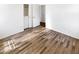 Bedroom with wood-look floors and doors that open to a closet at 12644 N 152Nd Ave, Surprise, AZ 85379