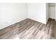 Bedroom featuring wood-look floors and a sliding-door closet for storing clothing at 12644 N 152Nd Ave, Surprise, AZ 85379