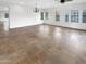 Expansive living room featuring tiled floors and an array of windows providing natural light at 12644 N 152Nd Ave, Surprise, AZ 85379