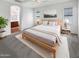 Serene bedroom with a neutral palette, carpet, ceiling fan, and an ensuite bathroom at 12644 N 152Nd Ave, Surprise, AZ 85379