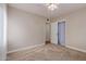 Bedroom with neutral walls, carpet, and a ceiling fan, offering comfort and style at 1316 E Vermont Ave, Phoenix, AZ 85014