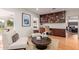 Cozy living room area with built-in shelving and comfortable seating near the backyard at 1316 E Vermont Ave, Phoenix, AZ 85014
