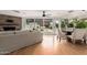 Open living space combines a dining area with a comfortable living room overlooking the backyard pool at 1316 E Vermont Ave, Phoenix, AZ 85014