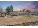 Full backyard view of the home with gazebo, landscaping, and desert view at 14814 N Coral Gables Dr, Phoenix, AZ 85023
