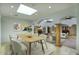Open concept dining area with tile flooring and seamless access to the living room at 14814 N Coral Gables Dr, Phoenix, AZ 85023