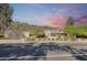 Stunning single-story home showcasing desert landscaping and a detached garage at 14814 N Coral Gables Dr, Phoenix, AZ 85023