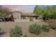 Beautiful single-story home with desert landscaping and charming architectural details at 14814 N Coral Gables Dr, Phoenix, AZ 85023