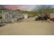 Exterior of home with a three-car garage and desert landscaping at 14814 N Coral Gables Dr, Phoenix, AZ 85023
