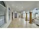Spacious foyer with marble flooring, archways, and decorative columns at 14814 N Coral Gables Dr, Phoenix, AZ 85023