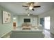 Inviting living room with neutral tones, cozy furniture, and access to the backyard at 14814 N Coral Gables Dr, Phoenix, AZ 85023