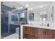 Beautiful bathroom featuring a glass enclosed shower and dual sink vanity at 15221 N Clubgate Dr # 2132, Scottsdale, AZ 85254