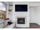 Cozy fireplace is a standout feature in the living room, and is flanked by bright windows at 15221 N Clubgate Dr # 2132, Scottsdale, AZ 85254