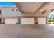 Spacious three-car garage with paved driveway at 15221 N Clubgate Dr # 2132, Scottsdale, AZ 85254