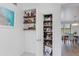 Organized pantry with stocked shelves and adjacent bar area, enhancing storage and entertaining options at 15221 N Clubgate Dr # 2132, Scottsdale, AZ 85254