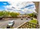 Upstairs balcony view overlooking ample community parking for residents and guests at 15221 N Clubgate Dr # 2132, Scottsdale, AZ 85254
