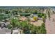 Expansive property featuring lush landscaping, pool, basketball court, horse property and detached structure at 1637 S Los Alamos Cir, Mesa, AZ 85204